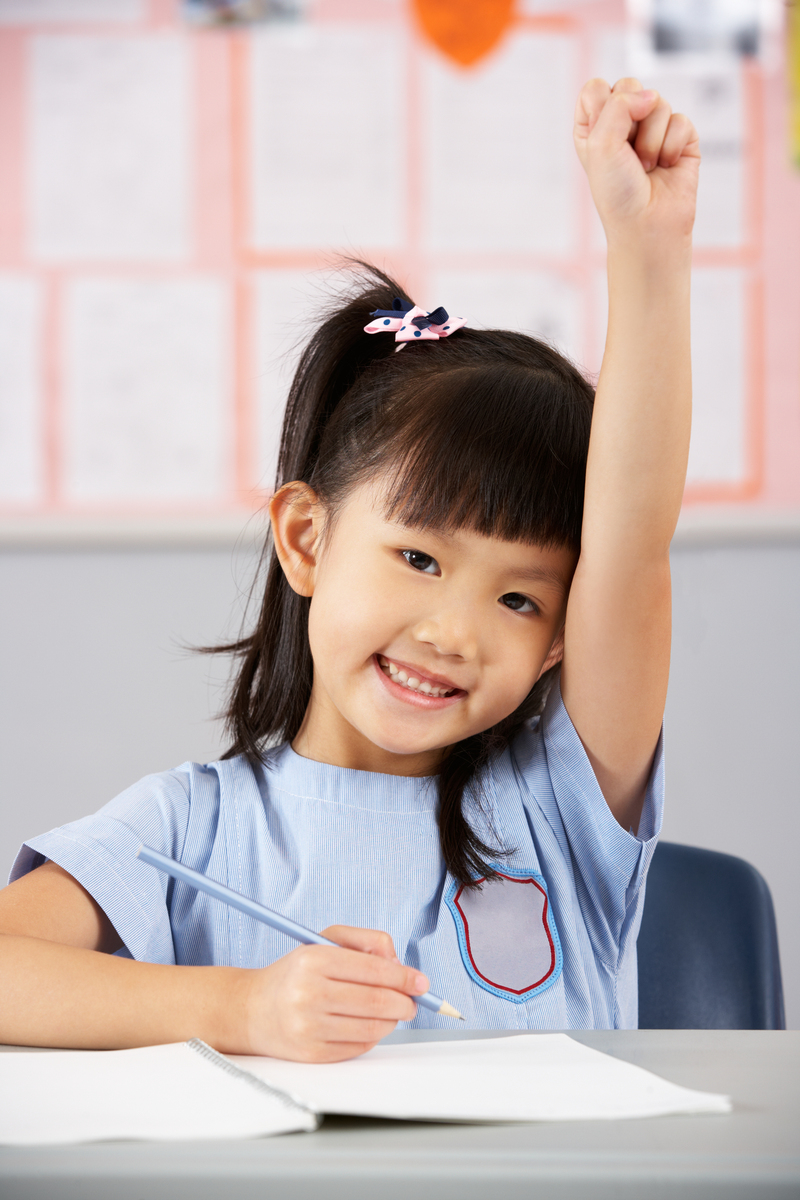 girl raising her hand