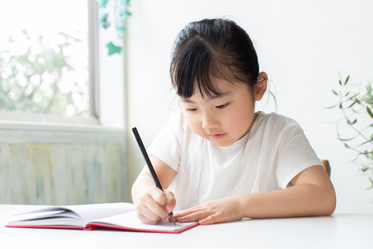 Girl writing notes