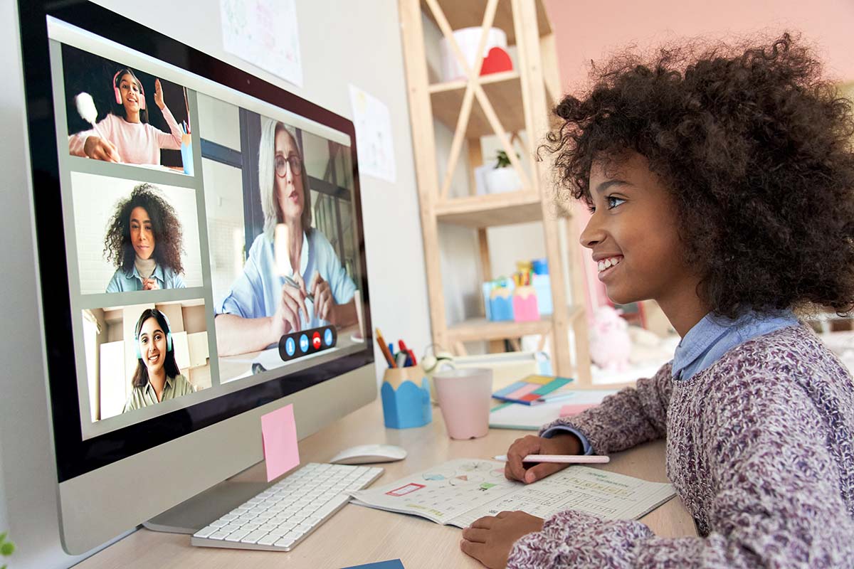 Girl watching class on screen . Online Teachers having class