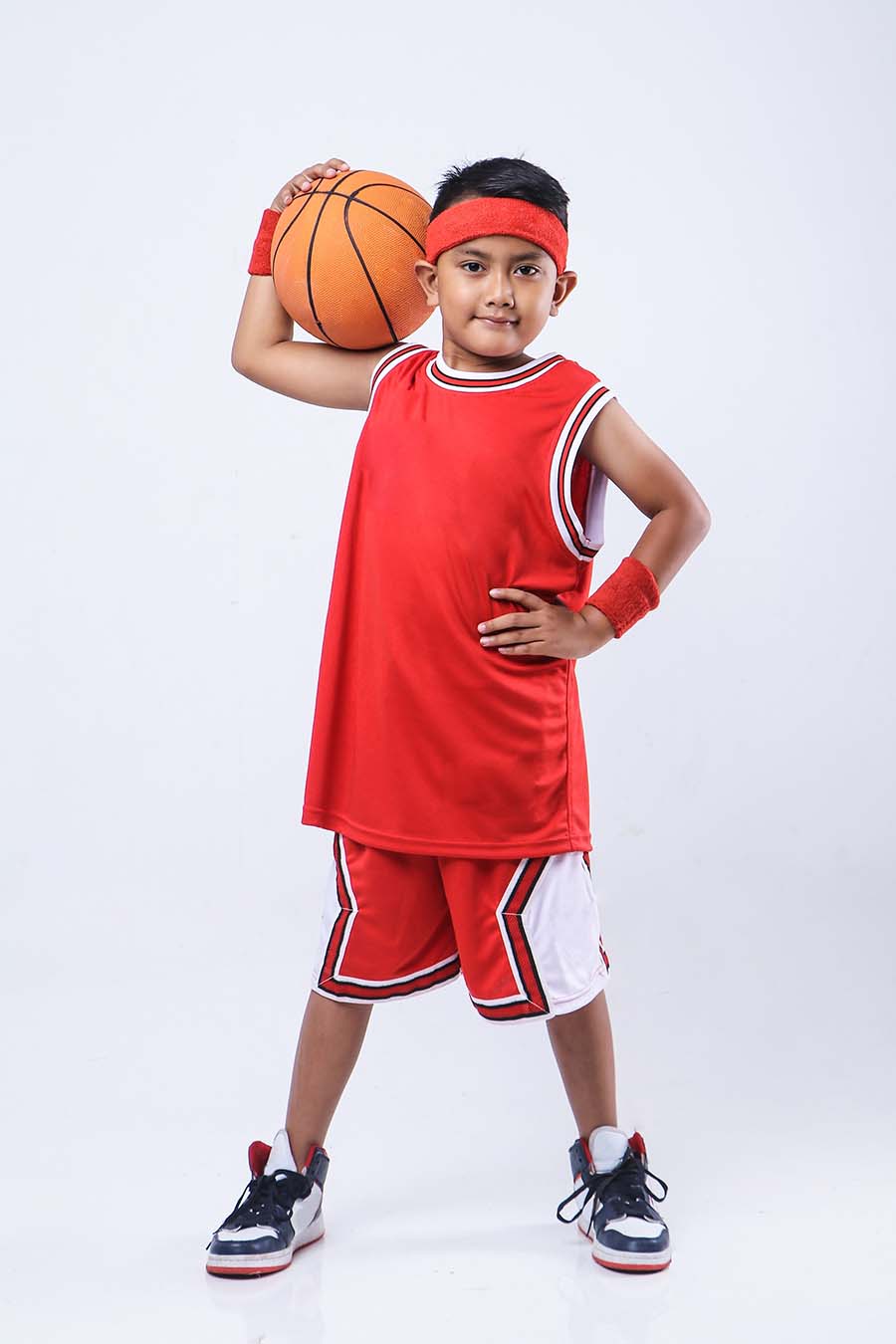Fun Basketball Math Facts for Kids kid ready to play basketball