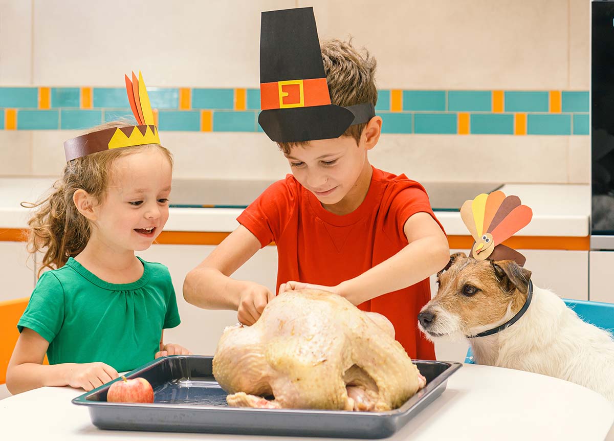 Kids stuffing a turkey. Free Thanksgiving 4th Grade Math Worksheets