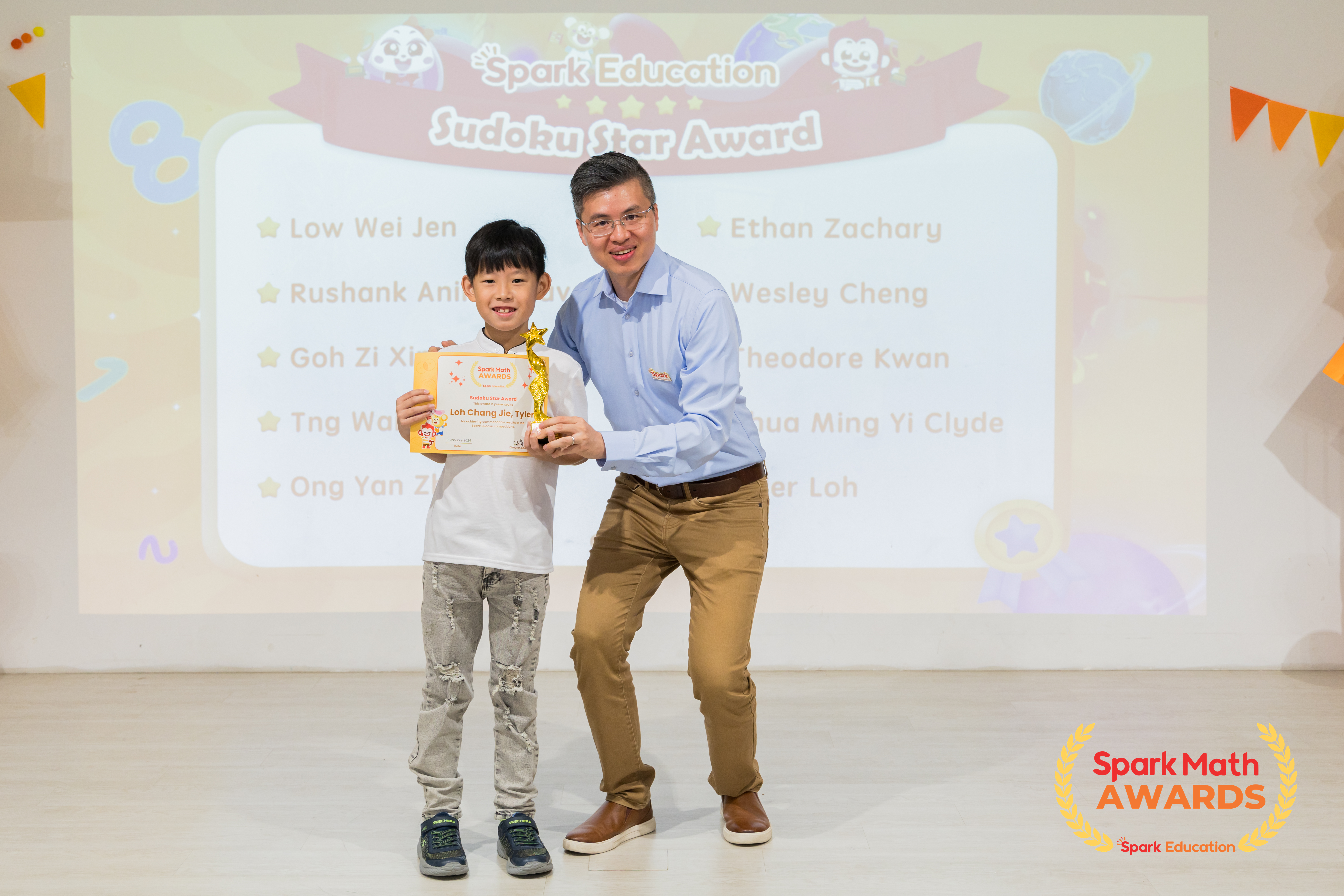 Mr. Xiaonan Wang, Co-founder and GM of Spark Education, presenting Sudoku Star awards to our top 10 Spark Math champs in various Spark Sudoku Cup competitions.