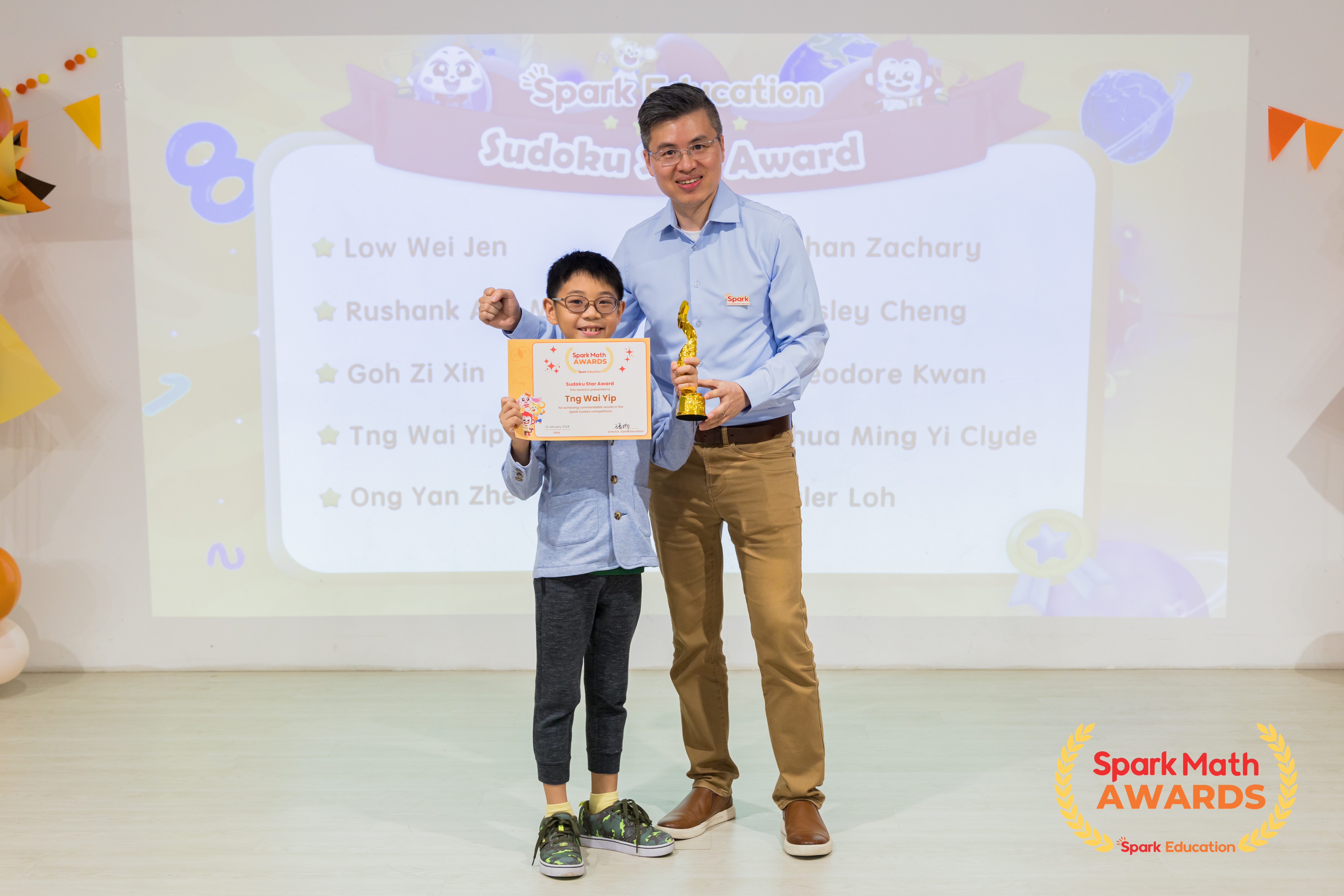 Mr. Xiaonan Wang, Co-founder and GM of Spark Education, presenting Sudoku Star awards to our top 10 Spark Math champs in various Spark Sudoku Cup competitions.